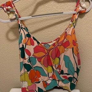 Crop top with spaghetti strap.